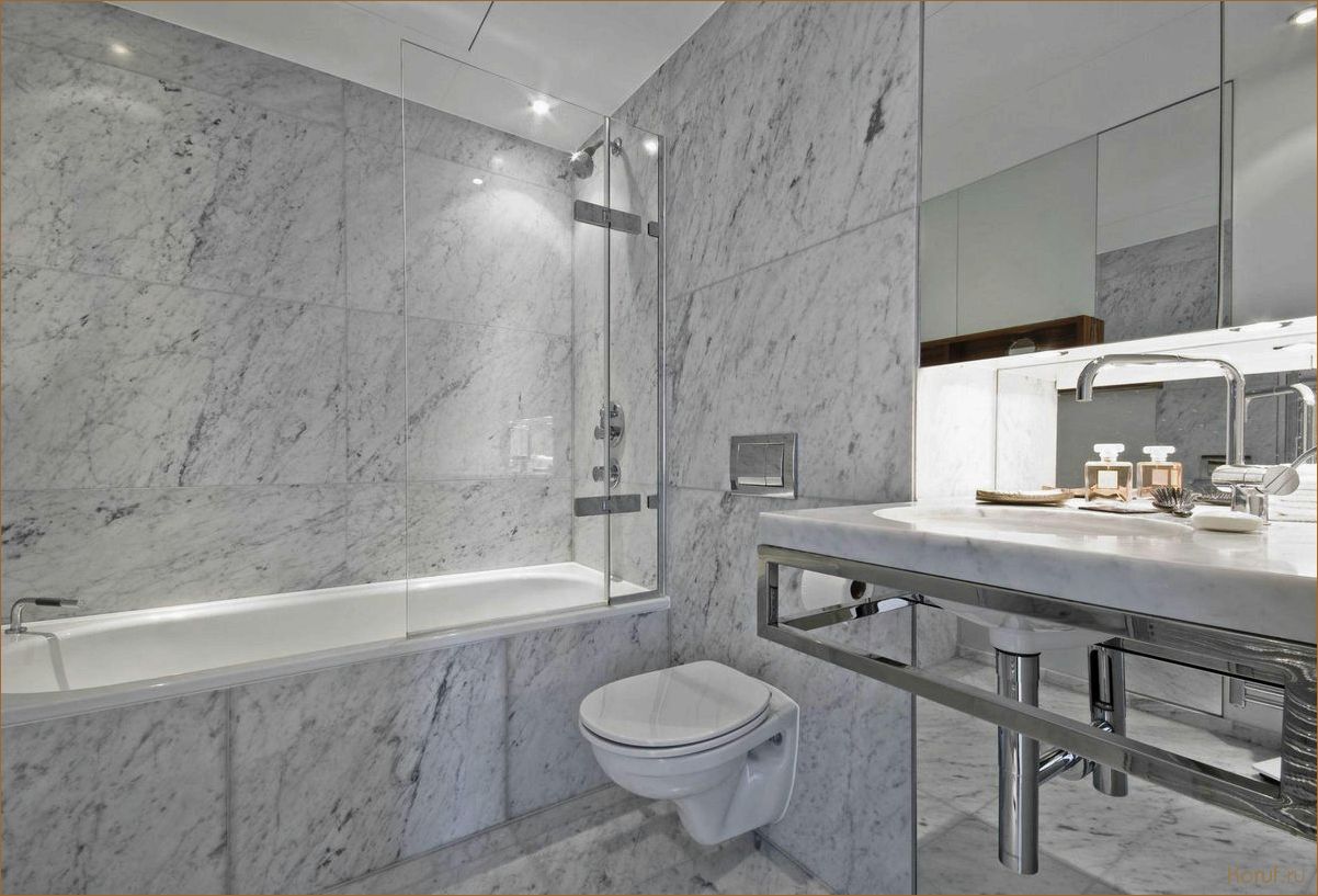 Как создать уют и элегантность в ванной с помощью душевой системы с мрамором и деревом: советы по дизайну и установке.